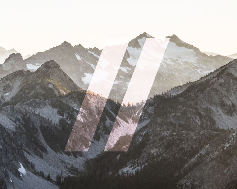 Adjuvant Capital logo with a mountain background