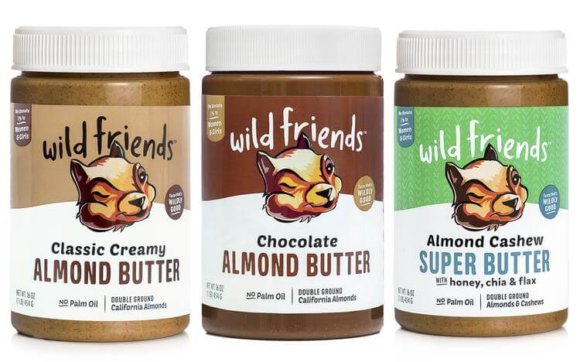 three bottles of wildfriends' almond butter in classic creamy, chocolate and almond cashew flavor