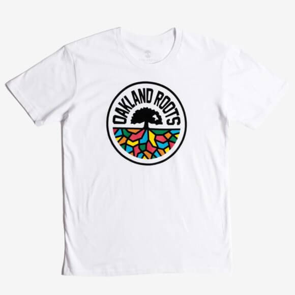 white t-shirt that has oakland roots on prints