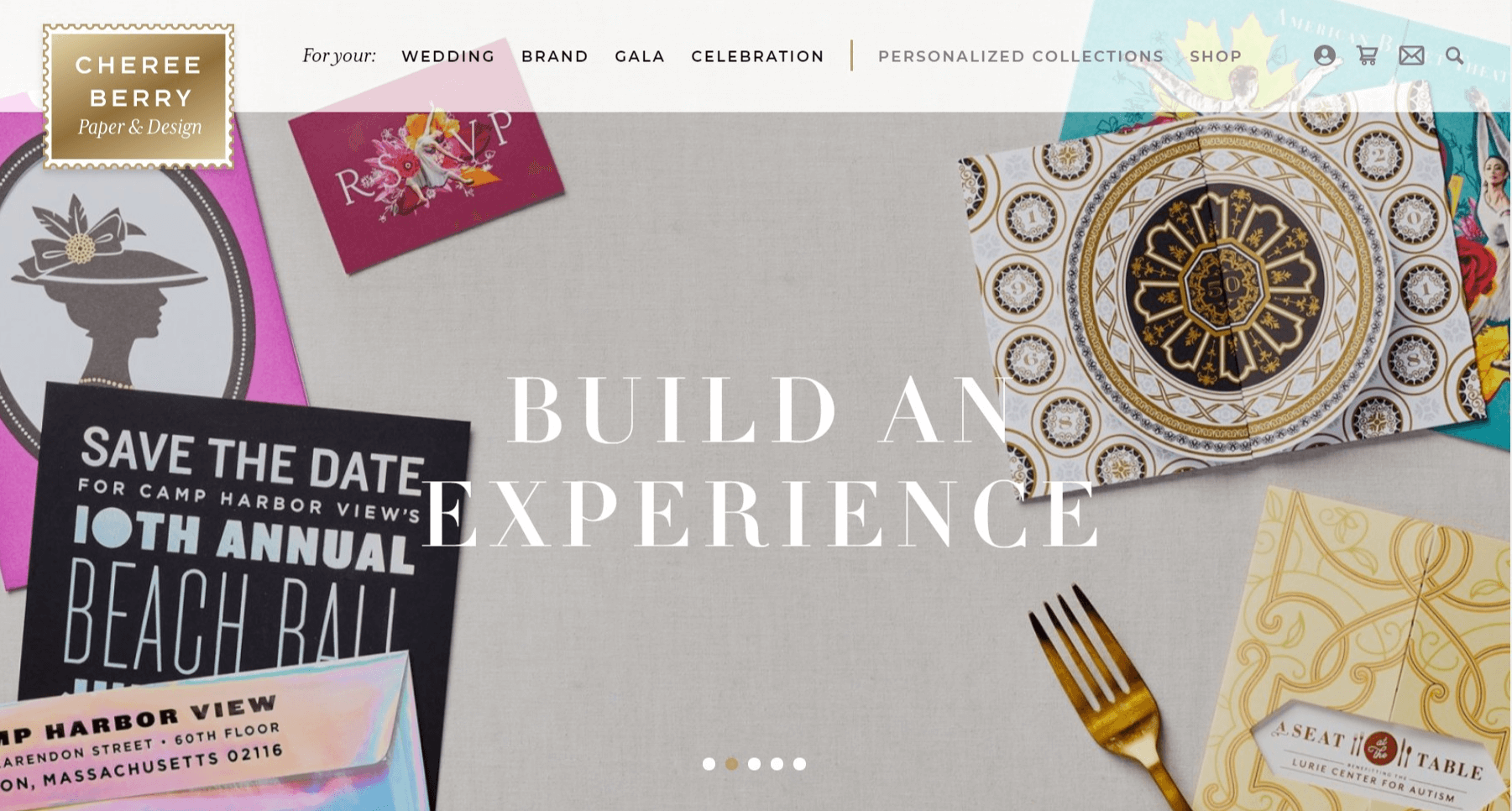 The homepage of Cheree Berry Paper & Design website with a nice flat lay of invitations